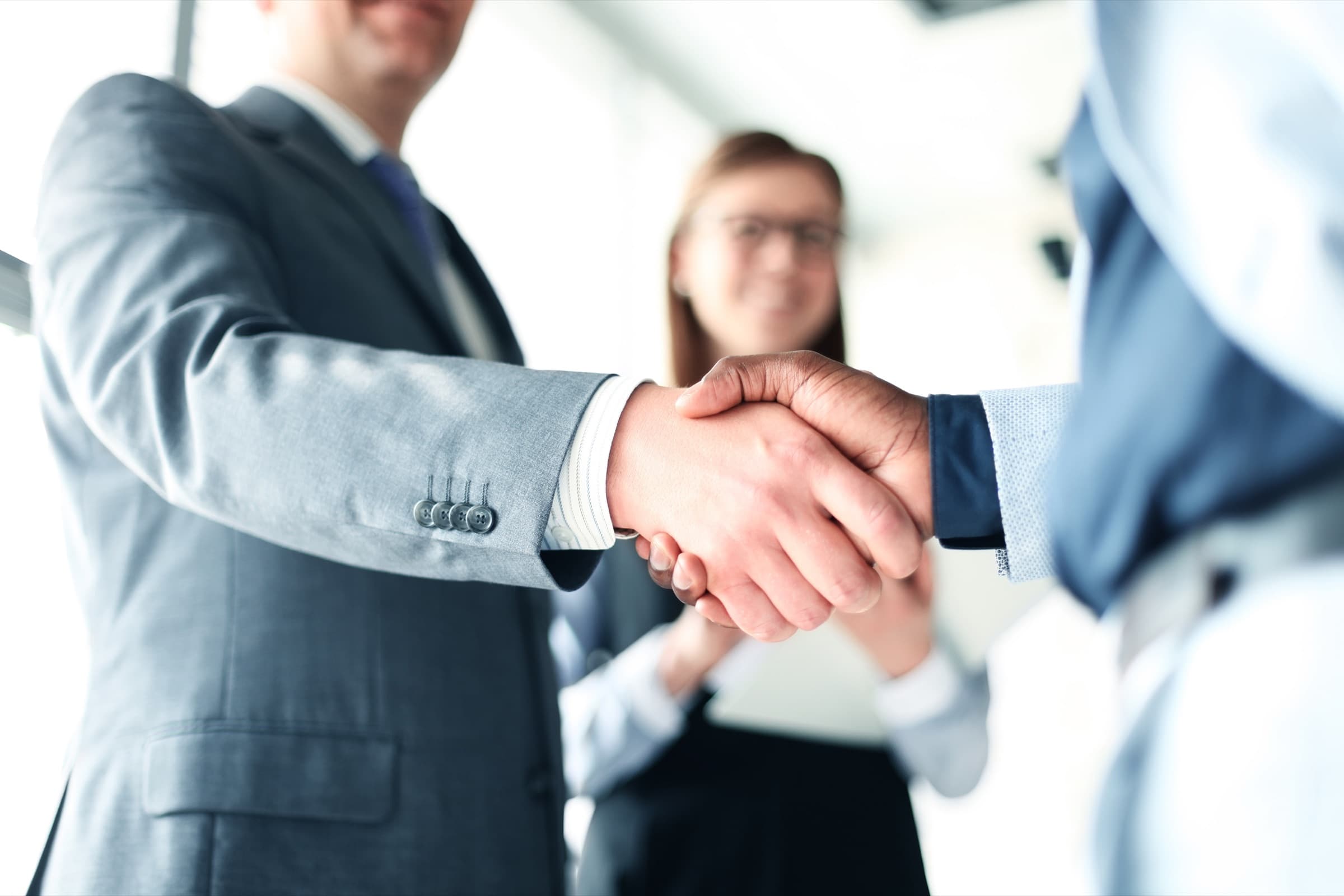 A handshake in an office